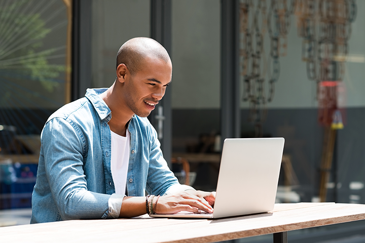 A guy using Laptop